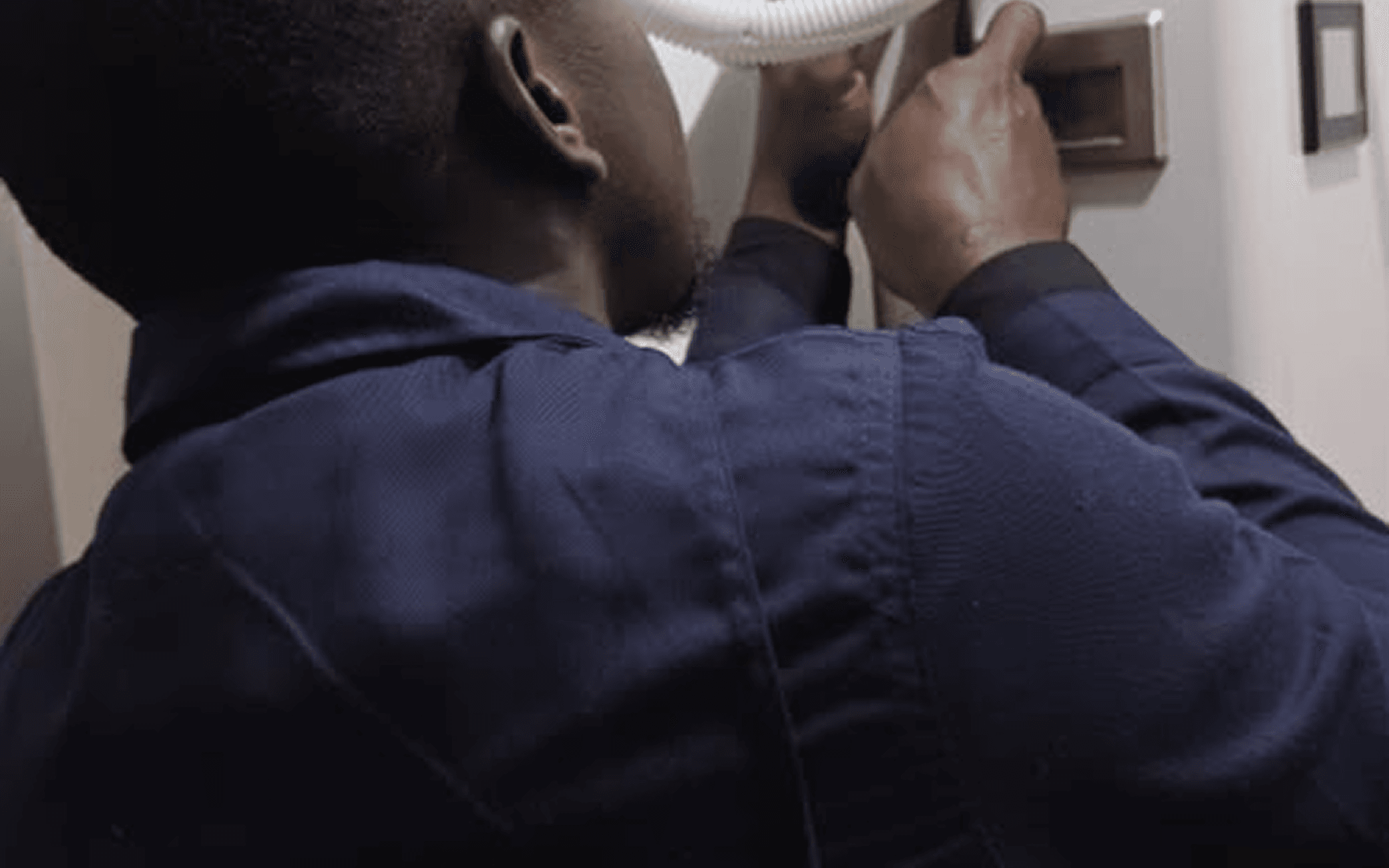Technician working on a solar panel system